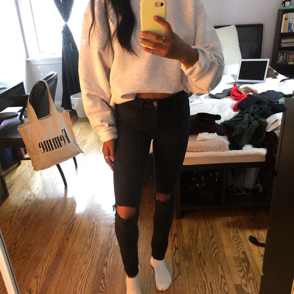 Black garage jeans with knee rips